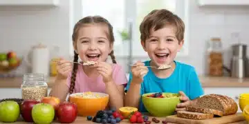Happy children enjoying a bowl of colorful fruits and oatmeal, promoting healthy eating.