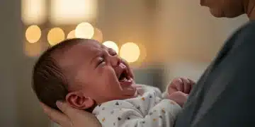 Parent comforting crying baby, close-up shot